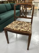 An inlaid mahogany dressing table chair