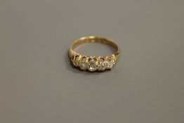 An antique 18ct gold five-stone diamond ring, approximately 0.