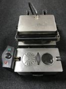 A commercial Silesia panini press and an electric fryer