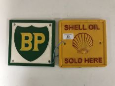 Two square cast iron signs - BP and Shell
