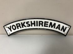 A cast iron Yorkshire man sign
