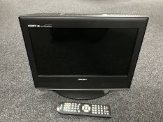 A Bush 15 inch LCD TV DVD with lead and remote
