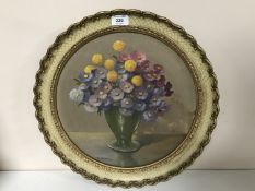 An oil on board - flowers in a vase by G.