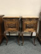 A pair of French walnut marble topped pot cupboards