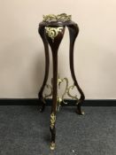 An ormolu mounted mahogany jardiniere stand