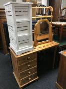 A pine four drawer dressing table with mirror,