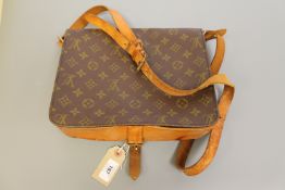 A Louis Vuitton lady's satchel handbag (strap repaired)