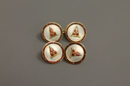 A pair of 18ct gold other of pearl and enamelled yachting squadron cufflinks