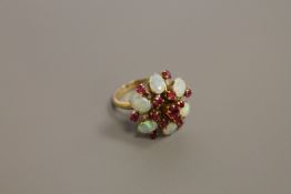 An 18ct gold opal and ruby cluster ring,