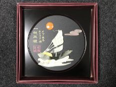 A modern Chinese relief panel of a junk boat