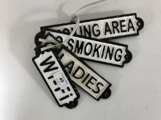 Six cast iron rectangular signs