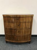 A continental walnut bowfronted four-drawer chest CONDITION REPORT: 79cm wide,