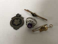 A lady's dress ring, a silver fob,