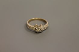 A 9ct gold diamond set ring,