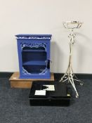 A painted wall cabinet, metal deed box,