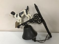 A cast iron bell - springer spaniel dog