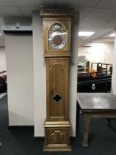 An early 20th century pine longcase clock by Markus Larsen of Ronne dated 1925
