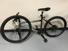 A boy's Shockwave XT 675 mountain bike (front wheel not attached)