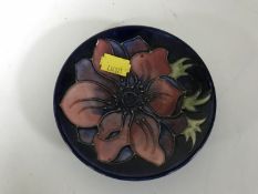 A Moorcroft pottery Magnolia pattern dish, width 10.