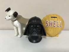 Three cast iron money boxes