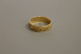 An 18ct gold band ring, 3.
