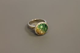 An 18ct gold chameleon ring set with diamonds and semi-precious stones
