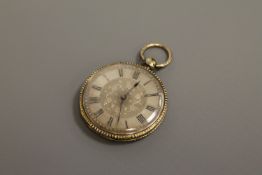 An antique Swiss 18ct gold and enamelled key wound pocket watch