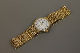 A lady's gold plated Raymond Weil quartz wristwatch,