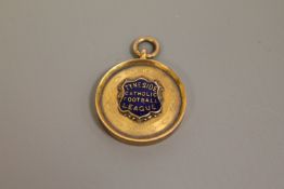 A 9ct gold enamelled Tyneside football medal, 10.
