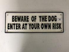 A cast iron sign - Beware of the dog