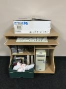 A contemporary computer desk containing PC system,