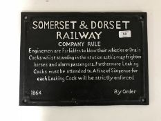 Two cast iron plaques - Somerset and Dorset