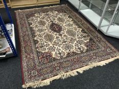 A red fringed woollen carpet on red ground