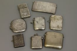 A collection of silver vesta cases and a card case