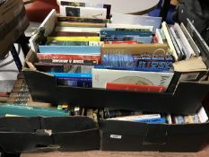 Three boxes of books relating to travel, British wildlife,