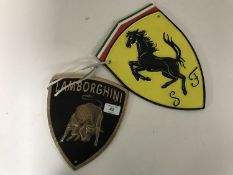 Two cast iron plaques - Ferrari and Lamborghini