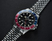 A RARE GENTLEMAN'S STAINLESS STEEL ROLEX OYSTER PERPETUAL GMT MASTER 