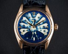 AN EXTREMELY RARE GENTLEMAN'S 18K SOLID PINK GOLD ROLEX OYSTER PERPETUAL WRIST WATCH CIRCA 1950s,