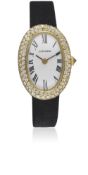 A LADIES 18K SOLID GOLD & DIAMOND CARTIER BAIGNOIRE WRIST WATCH CIRCA 1980s Movement: Manual wind,