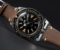 AN EXTREMELY RARE GENTLEMAN'S STAINLESS STEEL JAQUET DROZ 