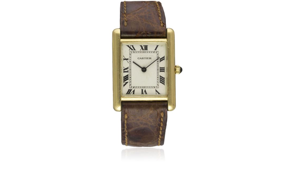 A GENTLEMAN'S 18K SOLID GOLD CARTIER TANK WRIST WATCH CIRCA 1970s Movement: Manual wind, signed
