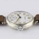 A GENTLEMAN'S SOLID SILVER LONGINES "OFFICERS" WRIST WATCH CIRCA 1920s, WITH ENAMEL DIAL Movement: - Image 12 of 13