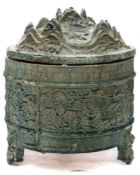 A Chinese green-glazed pottery Hill jar and cover: the domed cover relief moulded with five