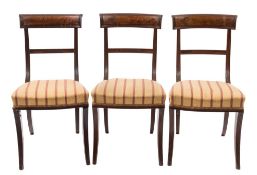 A set of six Regency mahogany dining chairs,