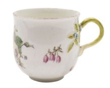 A Chelsea bell-shaped coffee cup: with twig handle and applied forget-me-not flowers and leaves,