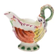 A First Period Worcester creamboat: of shell-shaped 'Dolphin Ewer' form with lamprey handle,