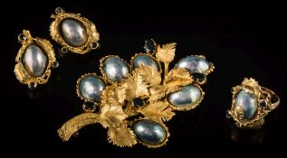 A suite of baroque cultured pearl and sapphire mounted jewellery: including brooch,