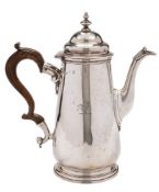 A George II silver coffee pot, maker's mark worn, London, 1744 ?: crested,