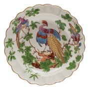 A First Period Worcester dessert plate: with scalloped rim,