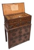 A carpenter's 18th Century oak tool chest on a stand:,